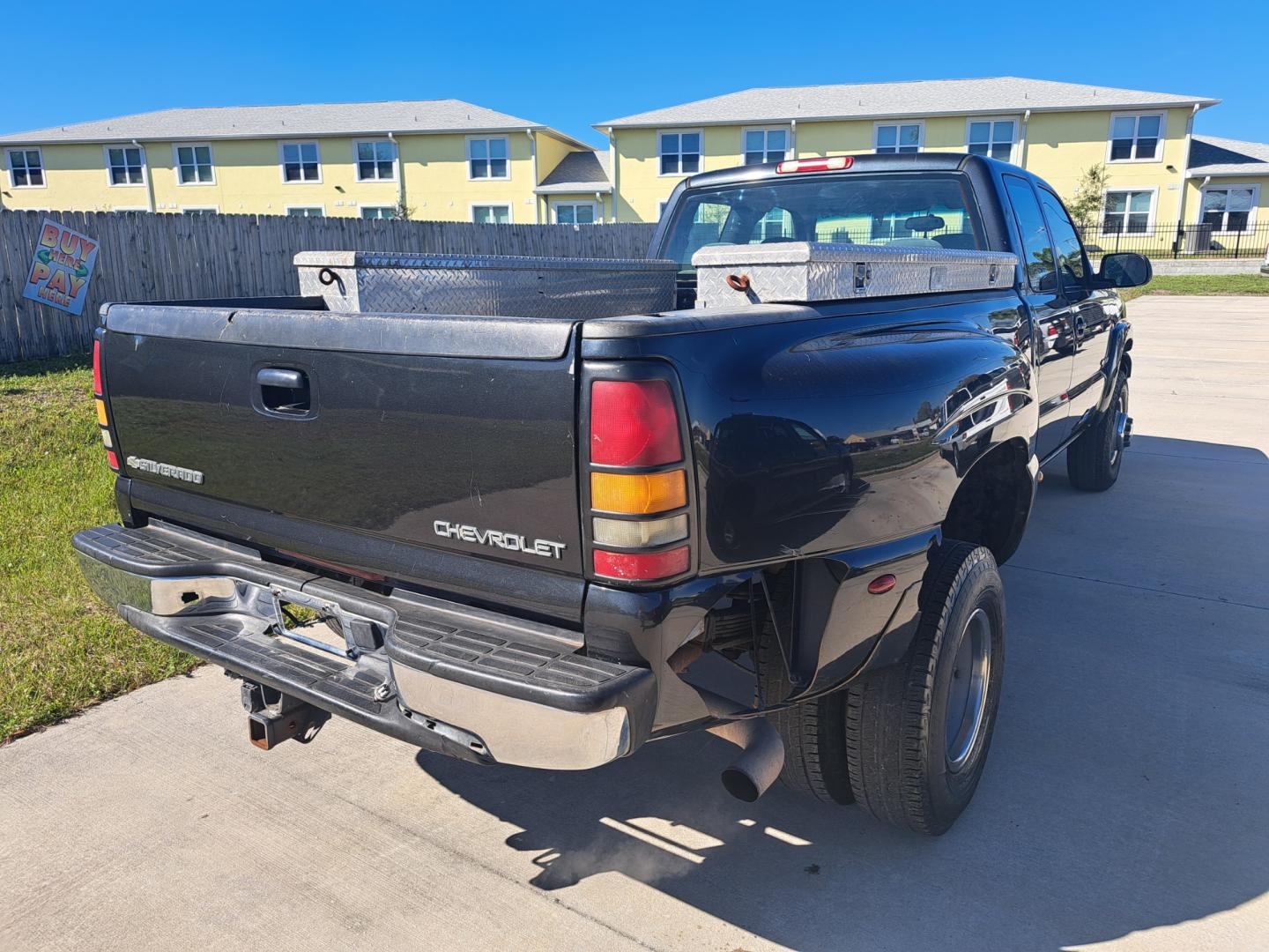 2003 Black Chevrolet Silverado 3500 Ext. Cab 2WD (1GCJC39U23E) with an 6.0L V8 OHV 16V engine, Automatic transmission, located at 1181 Aurora Rd, Melbourne, FL, 32935, (321) 241-1100, 28.132914, -80.639175 - Photo#1